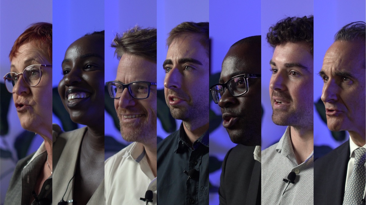 Seven of the series’ interviewees shown side by side in profile against a blue studio backdrop.