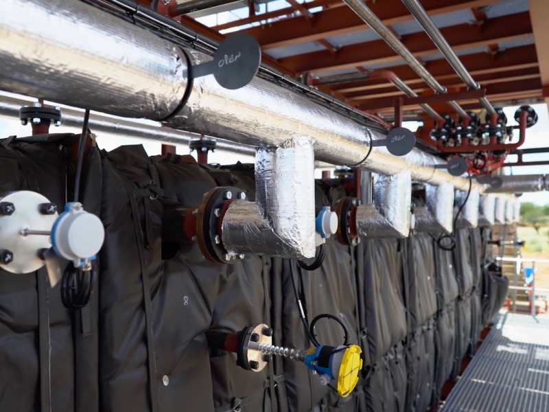 Insulated pipes and process vessels at the plant.